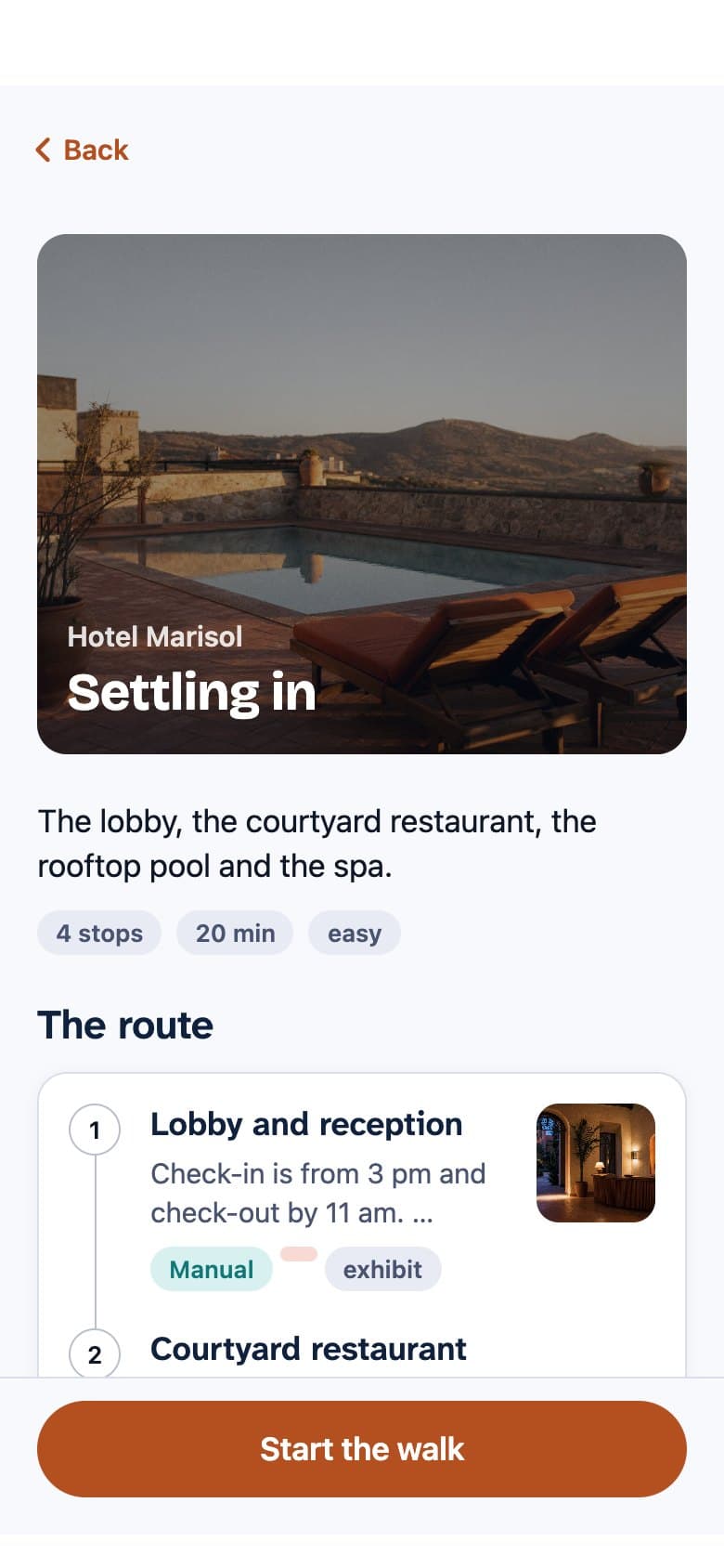 A route in a hotel with a terracotta brand colour